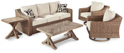 Ashley Furniture Beachcroft outdoor seating set with cushioned chairs and a matching table on a patio.