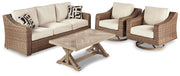 Ashley Furniture Beachcroft outdoor conversation set with cushioned chairs and a coffee table, ideal for patio or backyard seating.
