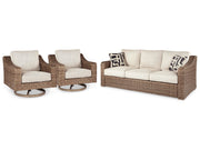 Ashley Furniture Beachcroft outdoor seating set with cushioned chairs and table, ideal for patio relaxation and outdoor entertaining.