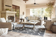 Ashley Furniture Beachcroft outdoor conversation set with cushioned chairs and table, perfect for patio outdoor seating.