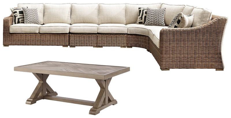 Outdoor Ashley Furniture Beachcroft outdoor seating set with cushioned chairs and a table, ideal for patio or garden relaxation.