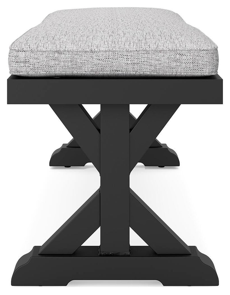 Ashley Furniture Beachcroft outdoor dining bench with cushion, sturdy wooden design, and comfortable seating for outdoor spaces.