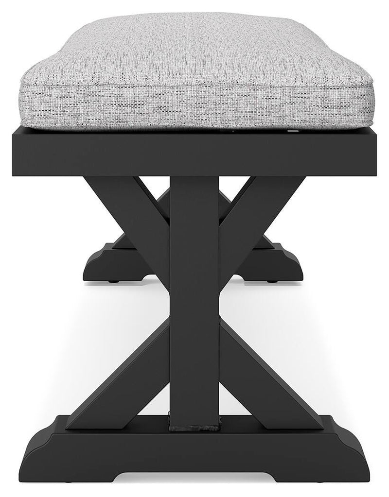 Ashley Furniture Beachcroft outdoor dining bench with cushion, featuring a sturdy wooden frame and comfortable seat for outdoor seating.