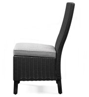 Set of two Ashley Furniture Beachcroft outdoor side dining chairs with cushions, featuring a stylish design and sturdy metal frame.