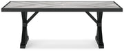 Ashley Furniture Beachcroft outdoor dining table with a wooden top and metal frame, perfect for patio outdoor dining setup.