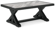 Ashley Furniture Beachcroft outdoor table set with a round table and four chairs, featuring a stylish outdoor patio design.