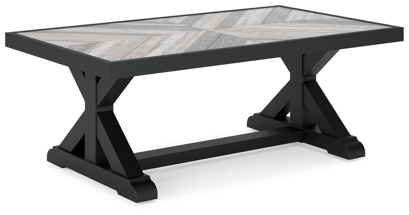 Ashley Furniture Beachcroft outdoor table set with a round table and four chairs, featuring a stylish outdoor patio design.