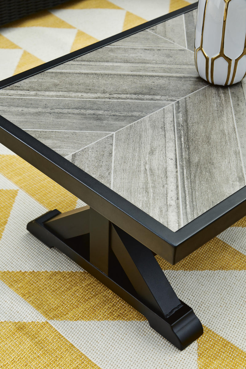 Outdoor Ashley Furniture Beachcroft outdoor cocktail table with a sleek wooden top and modern design for patio lounging.