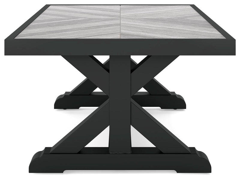Ashley Furniture Beachcroft outdoor cocktail table with a wooden slat top and metal frame, perfect for patio or garden seating areas.