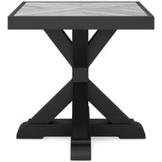 Ashley Furniture Beachcroft outdoor end table with a wooden top and metal frame, perfect for patio or garden decor.