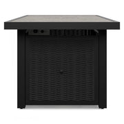 Outdoor Ashley Furniture Beachcroft fire pit table with a stone top and metal base, perfect for outdoor gatherings.
