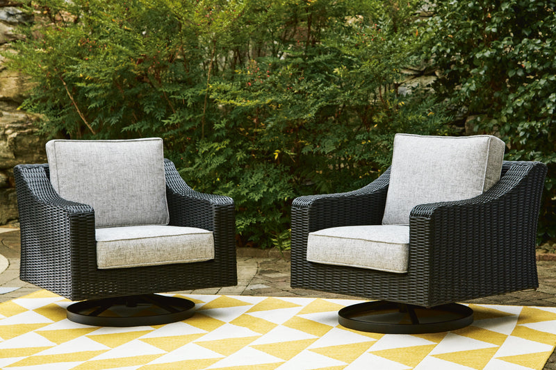 Ashley Furniture Beachcroft outdoor swivel lounge chair with cushion, featuring a stylish design and comfortable seating for outdoor relaxation.