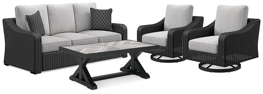 Outdoor table set from Ashley Furniture's Beachcroft collection, featuring a stylish table and matching chairs for outdoor dining.