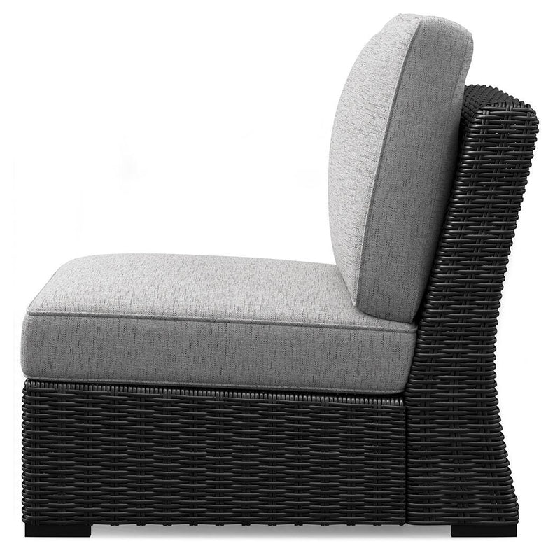 Outdoor sectional from Ashley Furniture's Beachcroft collection, featuring weather-resistant cushions and modern design.