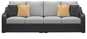 Ashley Furniture Beachcroft 2-piece outdoor loveseat sectional with cushions, featuring plush seating and stylish design.