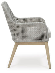 Ashley Furniture Seton Creek outdoor seating set with cushioned chairs and a matching table, ideal for patio relaxation.