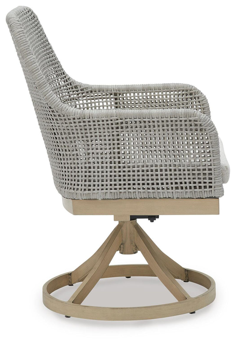 Seton Creek outdoor seating set by Ashley Furniture with cushioned chairs and a matching table, ideal for patio relaxation.