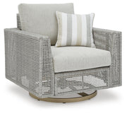Ashley Furniture Seton Creek outdoor upholstery set with table and chairs, featuring woven wicker design and neutral cushions.