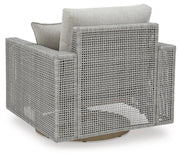 Outdoor Ashley Furniture Seton Creek outdoor table set with cushioned chairs and table, perfect for patio relaxation.