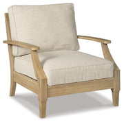 Ashley Furniture Clare View outdoor seating set with cushioned chairs and table, perfect for patio relaxation.