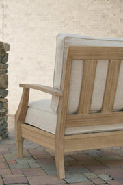 Close-up of the back of the Ashley Furniture Clare View outdoor lounge chair with cushion, showcasing its stylish design and craftsmanship.