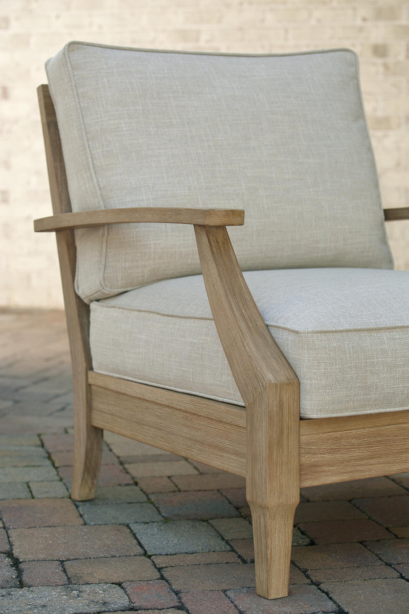 Outdoor lounge chair with cushion from Ashley Furniture, featuring a stylish Clare View design and comfortable seating.