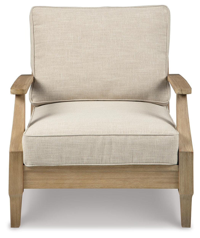 Ashley Furniture Clare View outdoor seating set with cushioned chairs and table, perfect for patio relaxation.