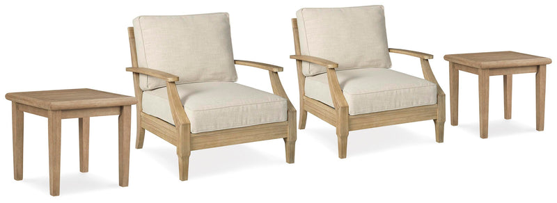 Ashley Furniture Clare View outdoor seating set with cushioned chairs and a central table for patio relaxation.