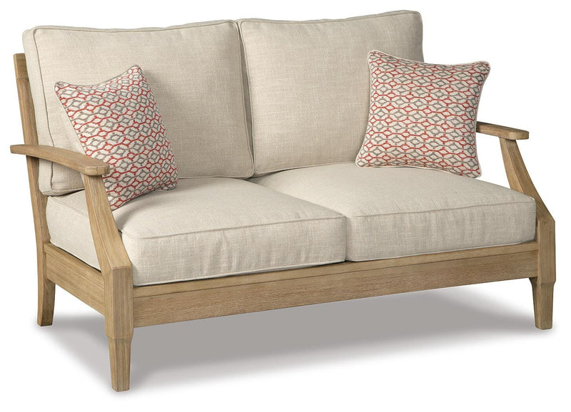Ashley Furniture Clare View outdoor loveseat with cushion, featuring a stylish frame and comfortable seating for outdoor spaces.