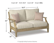 Outdoor Clare View loveseat with cushion from Ashley Furniture, featuring comfortable seating and stylish design.