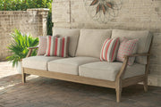 Ashley Furniture Clare View outdoor sofa with cushions, featuring a stylish and comfortable design for outdoor seating.