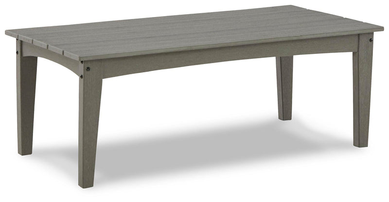 Ashley Furniture Visola outdoor occasional table set with two stylish tables featuring metal frames and glass tops.