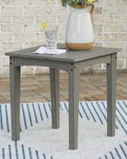 Ashley Furniture Visola outdoor occasional table set with two round tables and woven rattan design for patio or garden use.