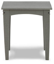 Ashley Furniture Visola outdoor occasional table set with two side tables featuring sleek metal frames and glass tops.