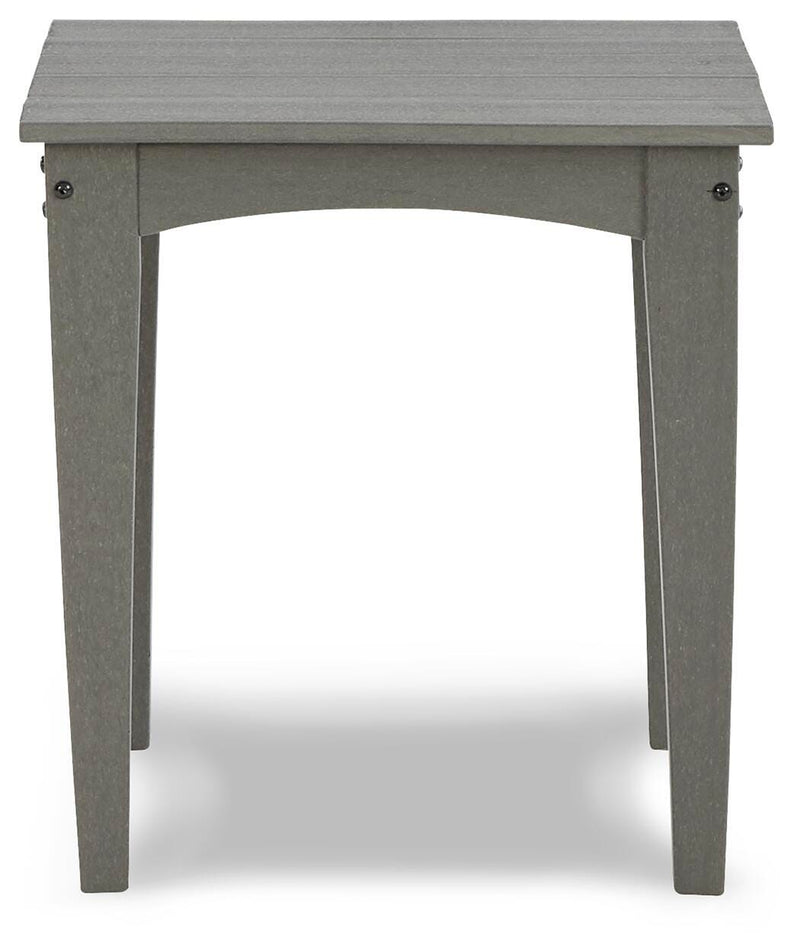 Ashley Furniture Visola outdoor occasional table set with two side tables featuring sleek metal frames and glass tops.