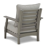 Ashley Furniture Visola outdoor sofa and loveseat set with matching table, featuring cushioned seating and modern outdoor design.