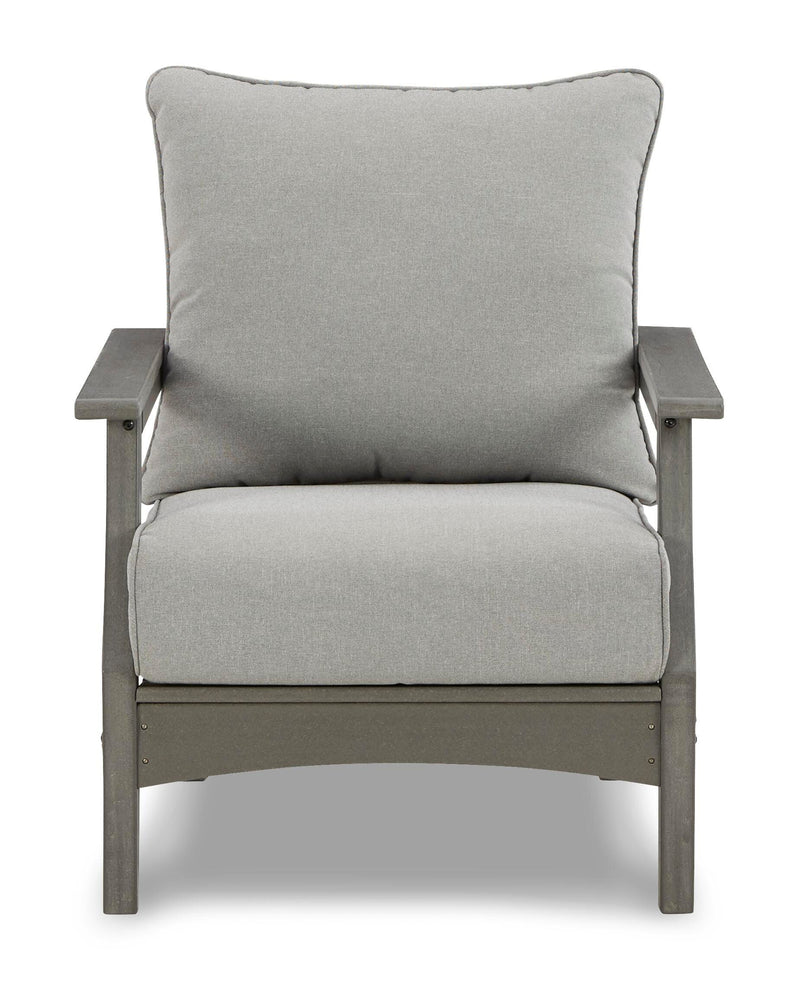 Ashley Furniture Visola outdoor sofa and loveseat set with matching table, featuring stylish cushions and a modern outdoor design.