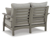 Ashley Furniture Visola outdoor sofa and loveseat set with matching table, featuring cushioned seating and stylish design.