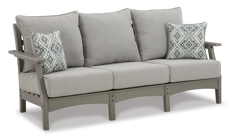 Ashley Furniture Visola outdoor sofa and loveseat set with a matching table, featuring comfortable cushions and stylish outdoor design.