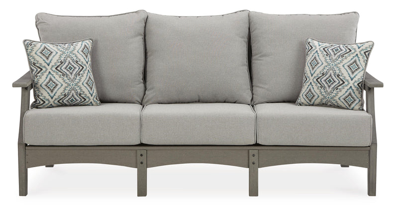 Ashley Furniture Visola outdoor sofa and loveseat set with matching table, featuring comfortable cushions and modern outdoor design.
