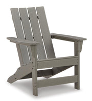 Ashley Furniture Visola outdoor Adirondack chair set with end table, featuring weather-resistant wood finish and comfortable seating.