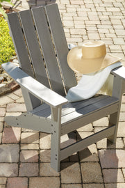 Ashley Furniture Visola outdoor Adirondack chair set with end table, featuring weather-resistant wood finish and comfortable seating.