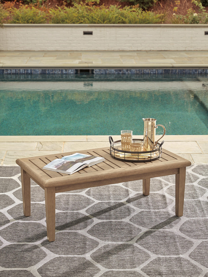 Ashley Furniture Clare View outdoor seating set with cushioned chairs and a matching table, perfect for patio relaxation.