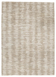 Ashley Furniture Abanlane 5' x 7' rug with intricate patterns and soft texture, ideal for living rooms and bedrooms.
