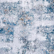 Ashley Furniture washable 5' x 7' medium rug featuring a soft, patterned design perfect for living rooms or bedrooms.