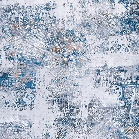 Ashley Furniture washable 5' x 7' medium rug featuring a soft, patterned design perfect for living rooms or bedrooms.