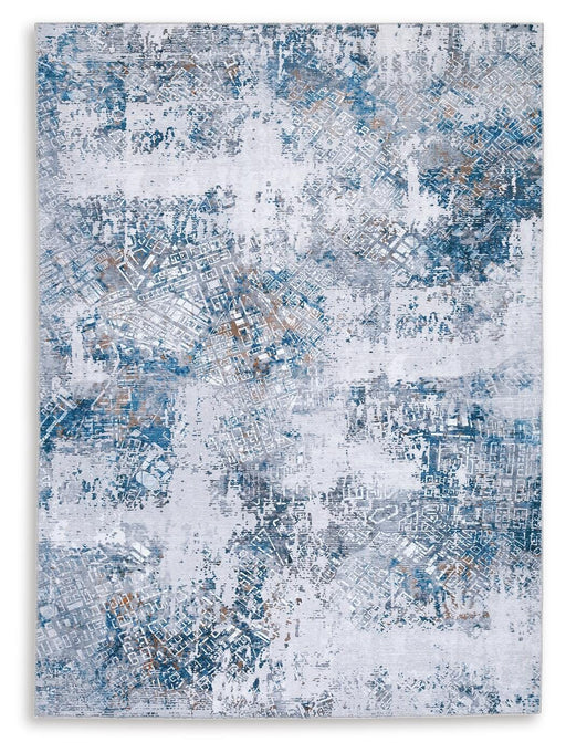 Medium Ashley Furniture Garyard 5x7 washable rug with intricate pattern, perfect for living rooms or bedrooms.