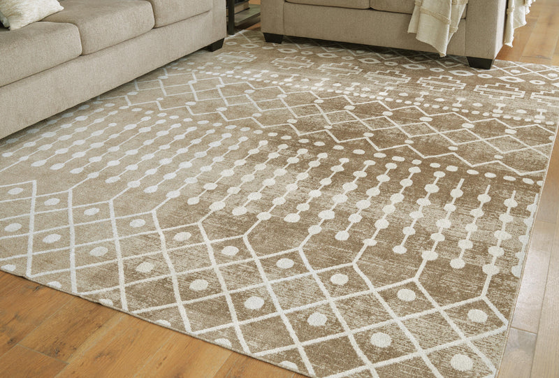 Large washable Ashley Furniture Bunchly rug, 7'10" x 10'3", with intricate patterns and soft texture, suitable for living room decor.