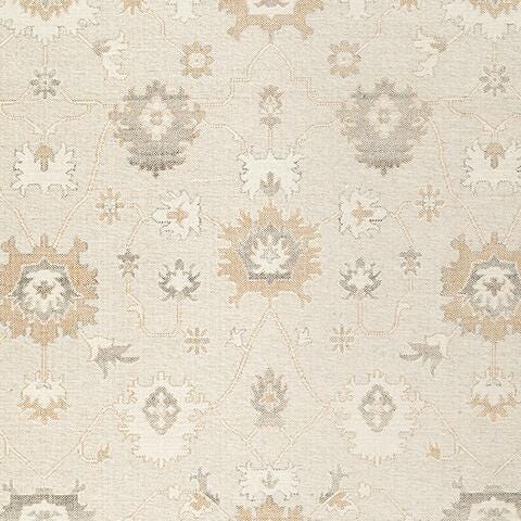 Swatch of Ashley Furniture Calkin Rug with intricate pattern in neutral tones, showcasing soft woven texture and stylish design.