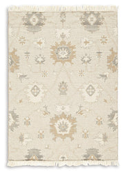 Ashley Furniture Calkin Rug with intricate patterns and warm tones, showcasing a soft, woven texture for cozy living spaces.